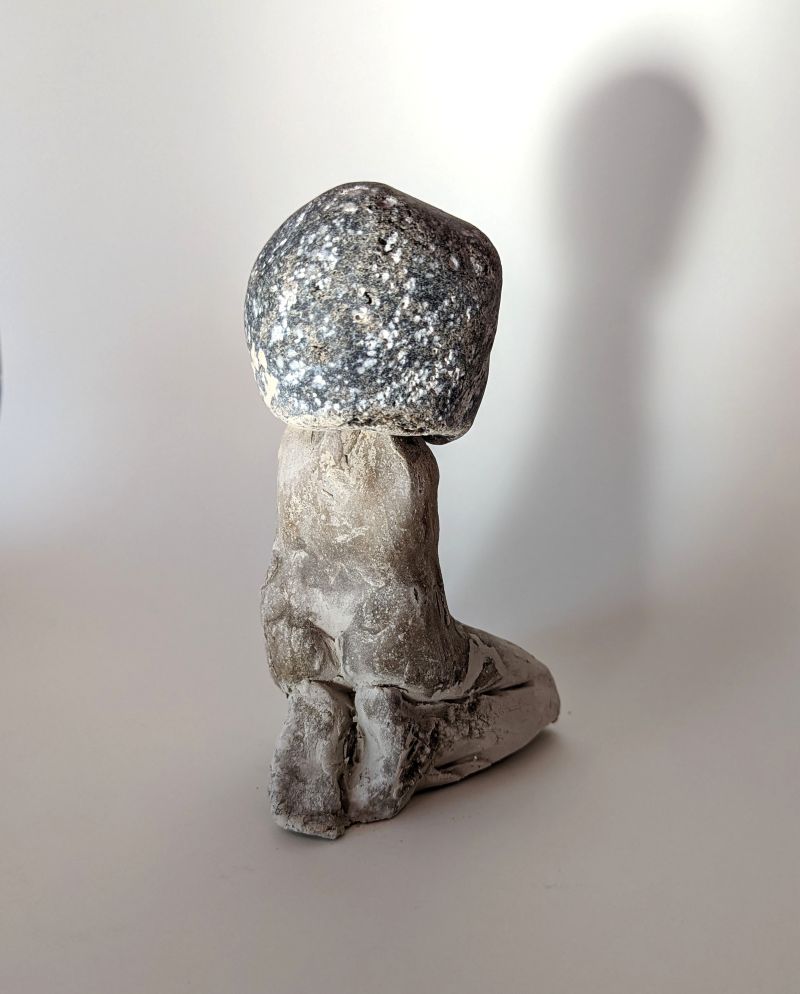 Kniende Figur